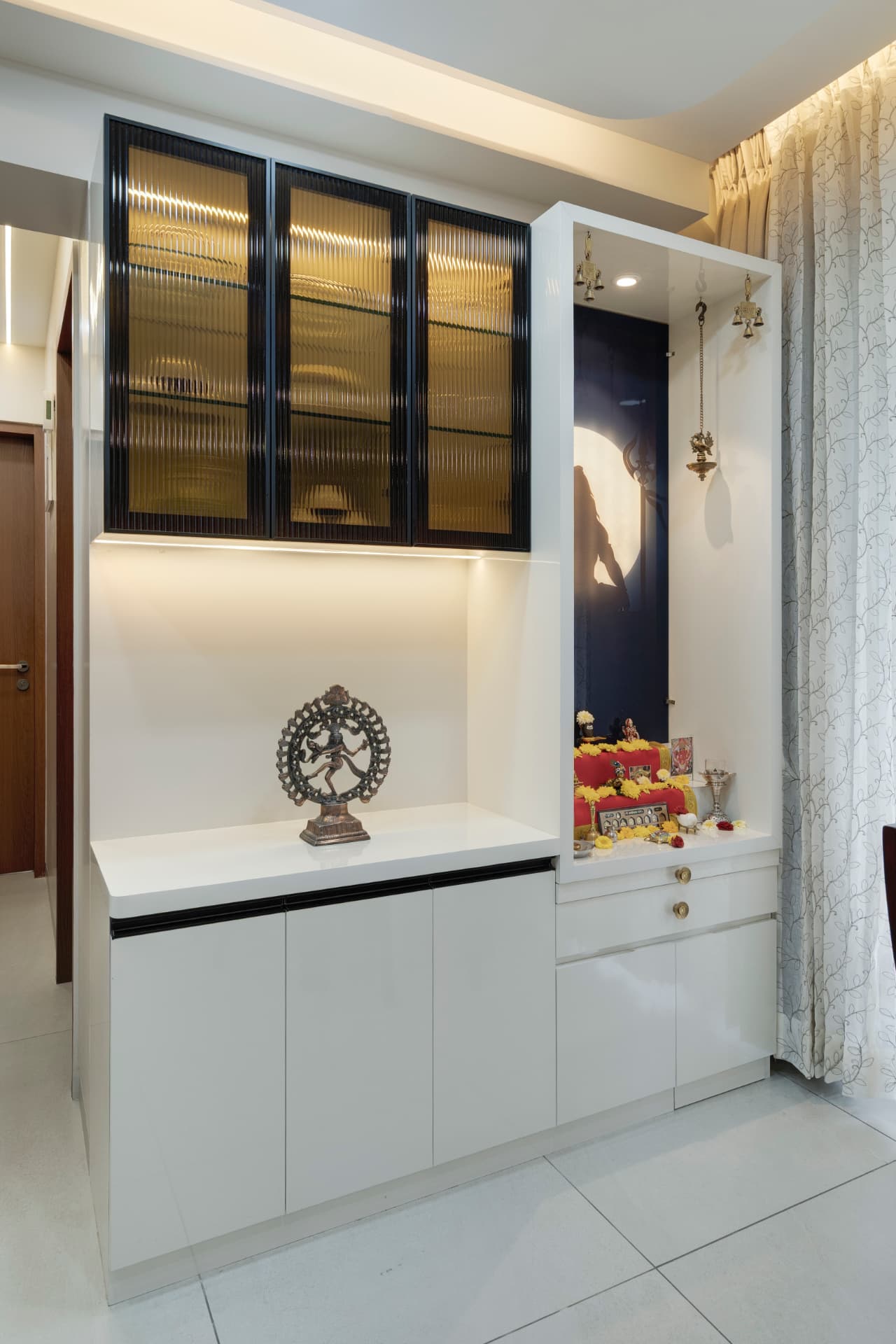Custom pooja and display unit at Dodke Palazzo by Viona Interiors